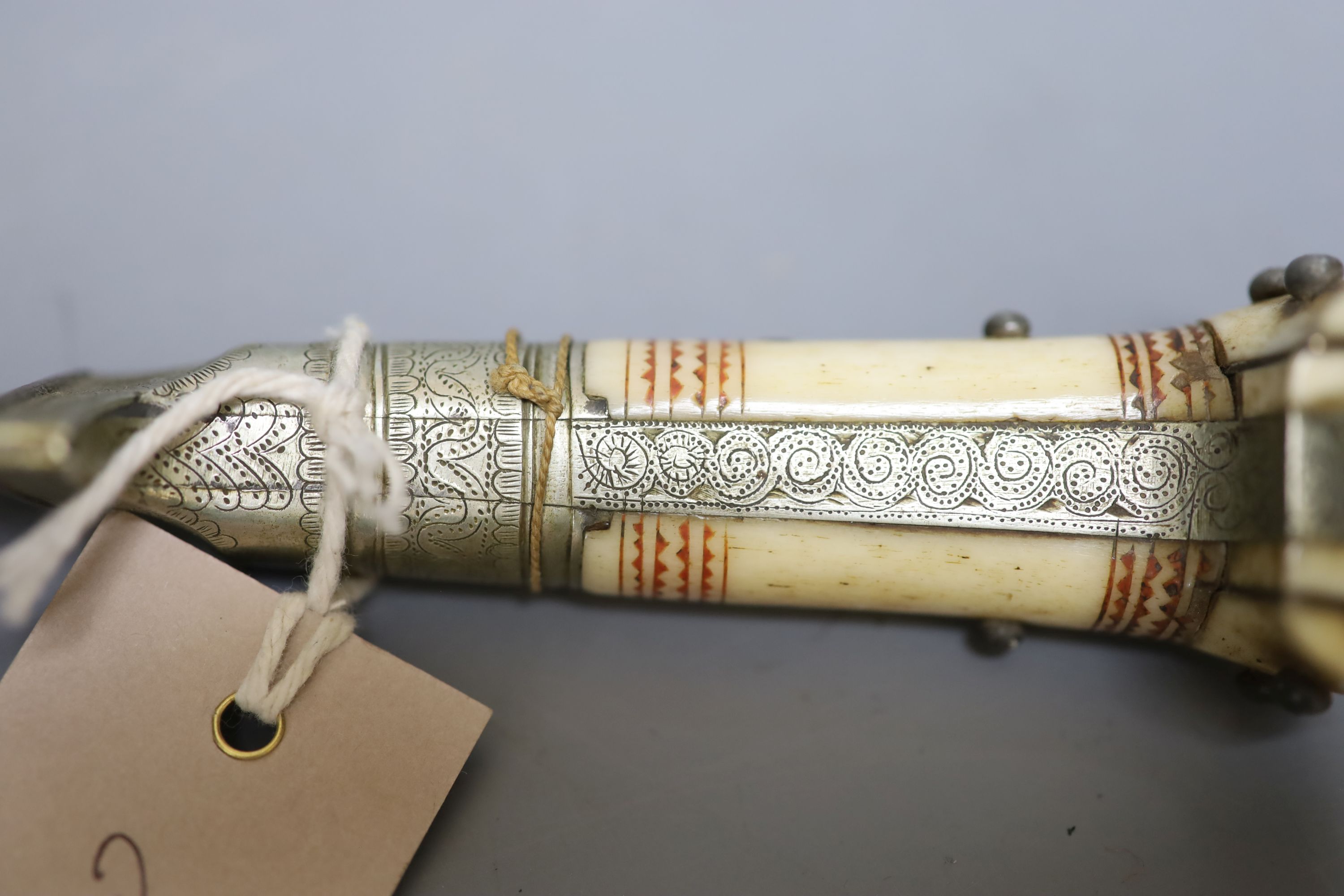 Two Indian army daggers, bone handles, one engraved 1939, with bone mounted handle, the other an ivory mounted handle